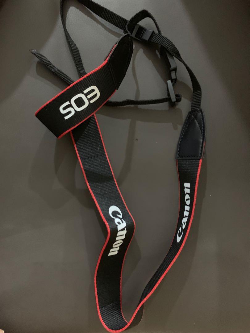 Canon EOS camera strap (Category: Cameras) located in Singapore. Submitted by amlev711 (Listing ID 224072000, Image 1). Description: Extra set, never used.