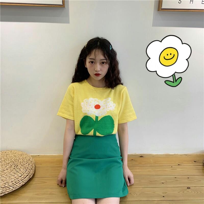 green skirt yellow top