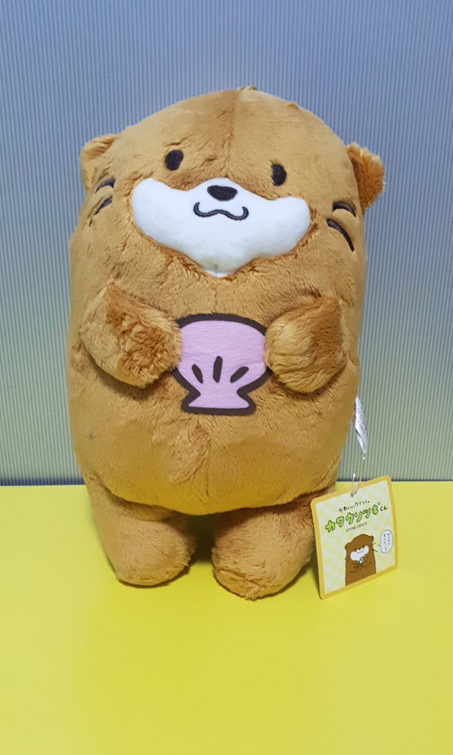 sad otter plush
