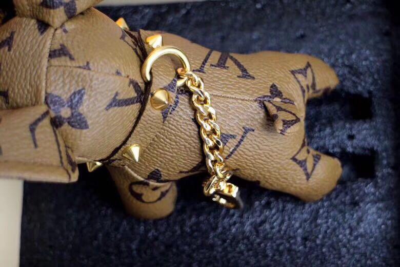Louis Vuitton Bag Charm and Key Holder Flying Cat Catogram Gold in
