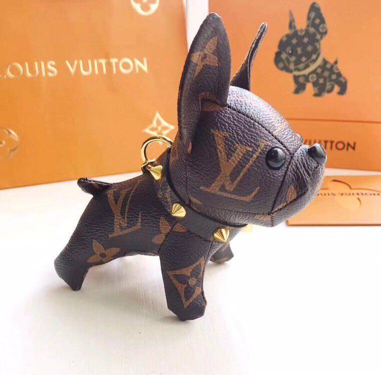 Accessory Bag or keychain Luis Vuitton Plush LV leather dog - Color Black,  Gold Chain