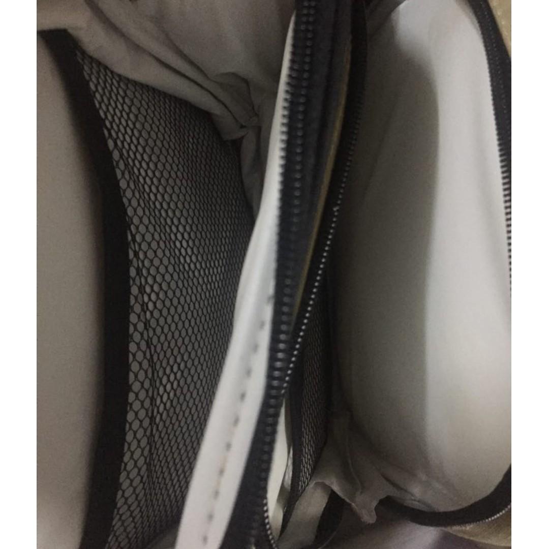 Baby Bag (Category: Diaper Bags & Wetbags) located in Las Pinas. Submitted by totsandtoddsph (Listing ID 224494780, Image 2). Description: Bought abroad; never used. Very handy, not bulky baby bag. With pockets and compartment. (See photo) High quality, with thermal insulator, and can be adjusted for more space..