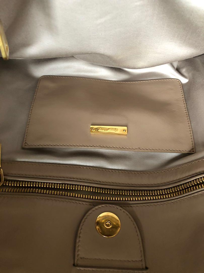 Miumiu Prada (Category: Luxury Bags & Wallets) located in Makati City. Submitted by travelbag (Listing ID 223973295, Image 2). Description: Almost new bought in the Prada outlet last year. No flaws- With dust bag only serious buyers please- price quoted is the final price no more discount pls .