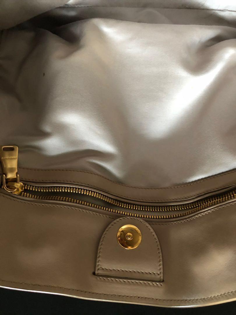 Miumiu Prada (Category: Luxury Bags & Wallets) located in Makati City. Submitted by travelbag (Listing ID 223973295, Image 3). Description: Almost new bought in the Prada outlet last year. No flaws- With dust bag only serious buyers please- price quoted is the final price no more discount pls .