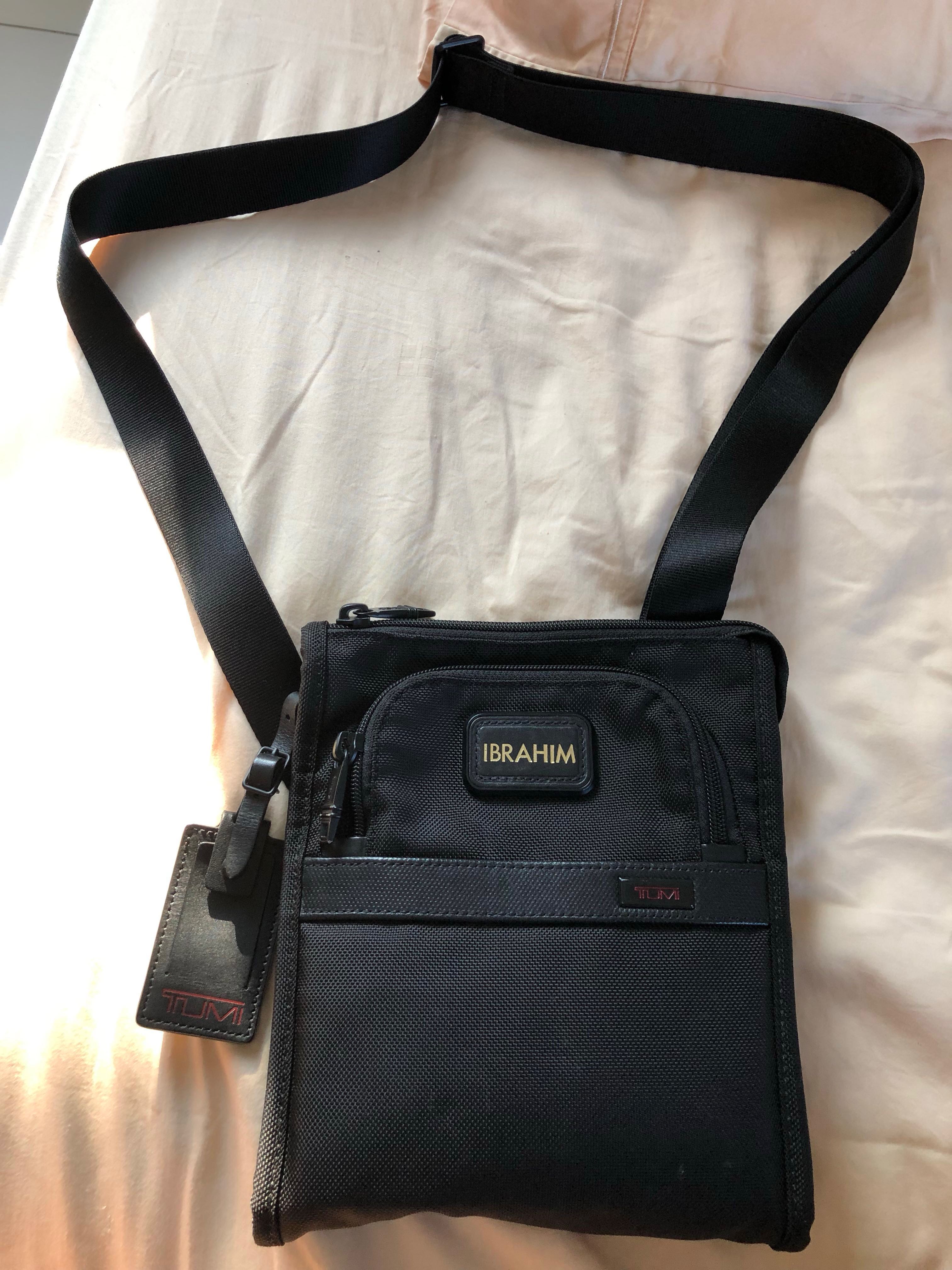 Tumi pocket on sale bag