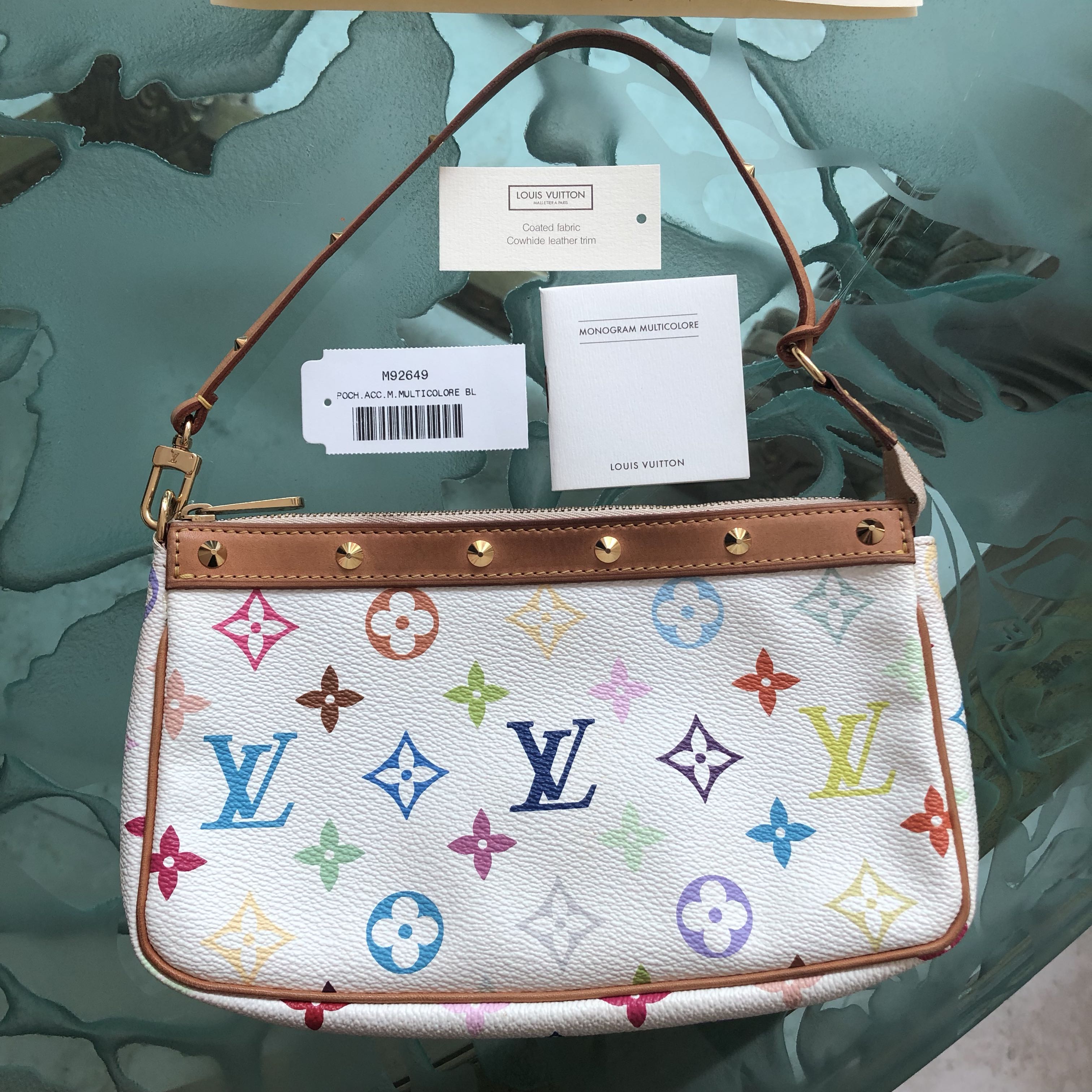 Louis Vuitton Multicolor Takashi Murakami Pochette, Luxury, Bags & Wallets  on Carousell