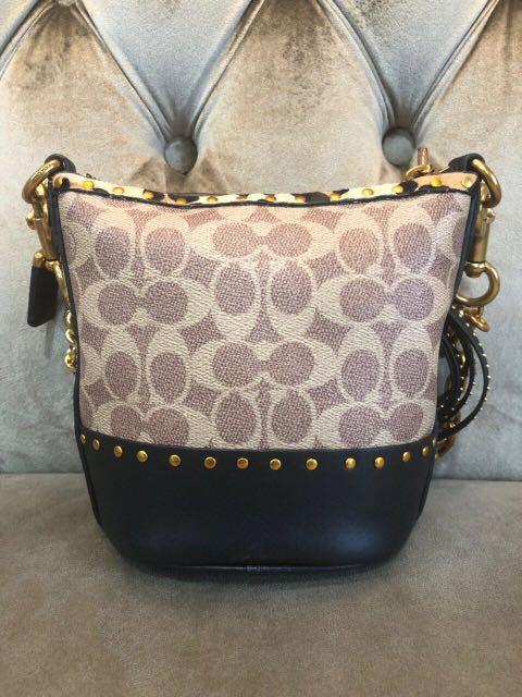 Disney x coach duffle outlet 12 in signature patchwork