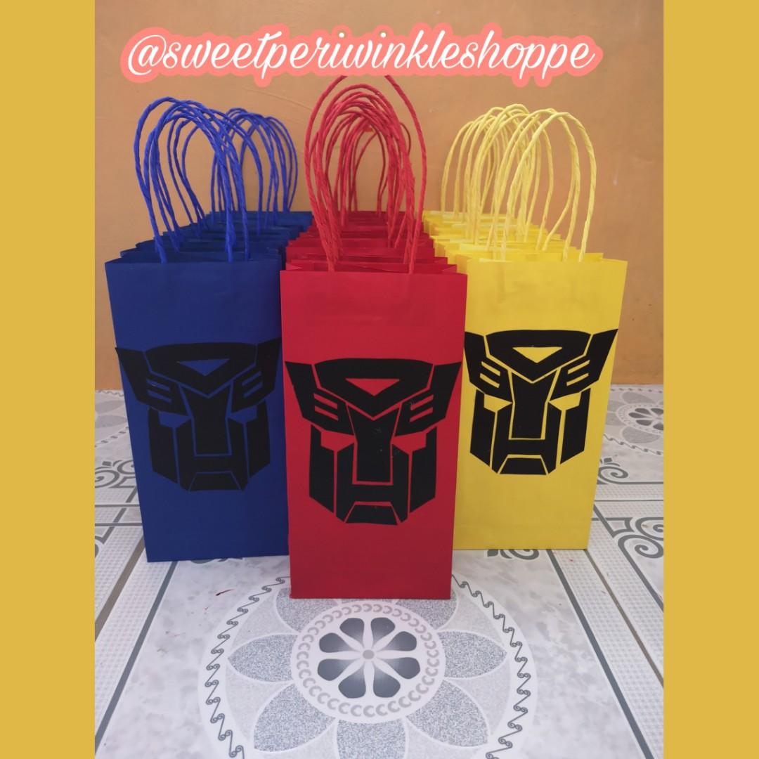 MTO Transformers Loot Bags (Category: Character Goods) located in Taguig. Submitted by sweetperiwinkleshoppe (Listing ID 224737990, Image 2). Description: PM us to order. #transformers #bumblebee #optimusprime #transformersph #partyph #eventsph #madetoorder #taguigbased #lootbags #goodiebags #favorbags #paperbags.