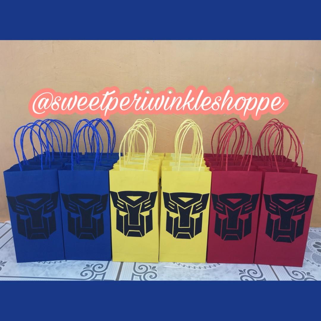 MTO Transformers Loot Bags (Category: Character Goods) located in Taguig. Submitted by sweetperiwinkleshoppe (Listing ID 224737990, Image 3). Description: PM us to order. #transformers #bumblebee #optimusprime #transformersph #partyph #eventsph #madetoorder #taguigbased #lootbags #goodiebags #favorbags #paperbags.