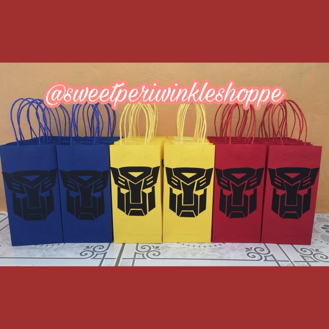 MTO Transformers Loot Bags (Category: Character Goods) located in Taguig. Submitted by sweetperiwinkleshoppe (Listing ID 224737990, Image 1). Description: PM us to order. #transformers #bumblebee #optimusprime #transformersph #partyph #eventsph #madetoorder #taguigbased #lootbags #goodiebags #favorbags #paperbags.