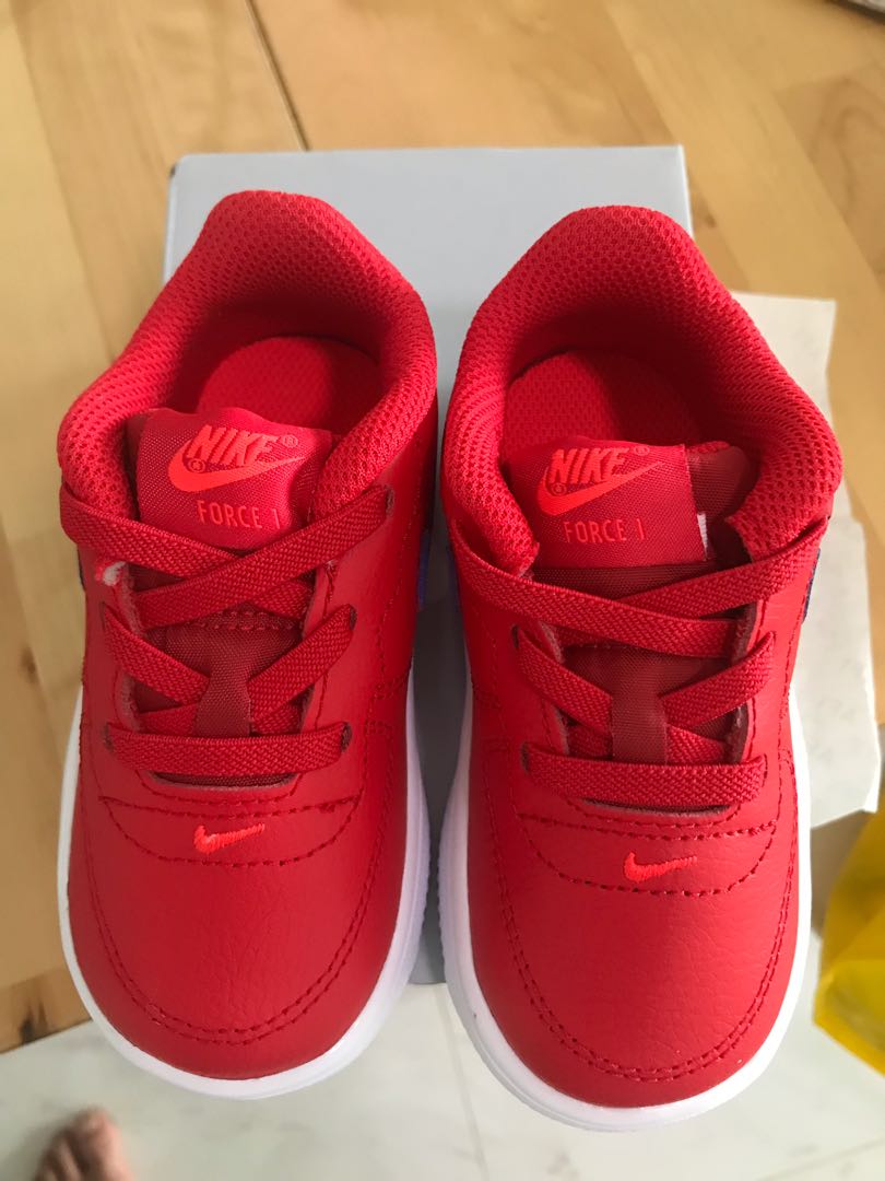 baby red nike shoes