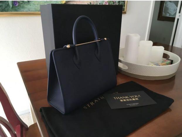 Strathberry Midi tote bag in Black leather with gold hardware, Women's  Fashion, Bags & Wallets, Cross-body Bags on Carousell