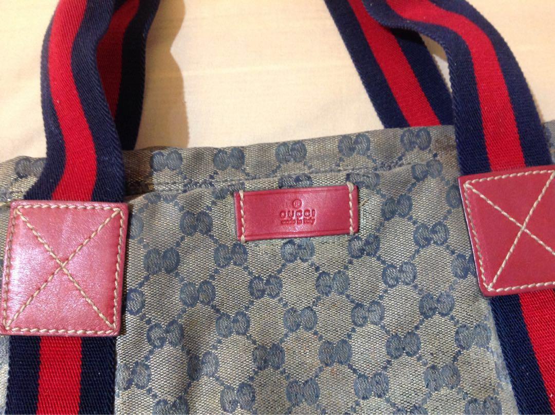 Authentic Gucci (Category: Luxury Bags & Wallets) located in Paranaque City. Submitted by french21closet (Listing ID 225128212, Image 2). Description: 100% wAuthentic Gucci Open Tote bag Needs for restoration as the crystalized color style is not visible anymore, that’s the major flaws but inside interior still good for serious buyers only PM me if interested/SMS 09174506853.