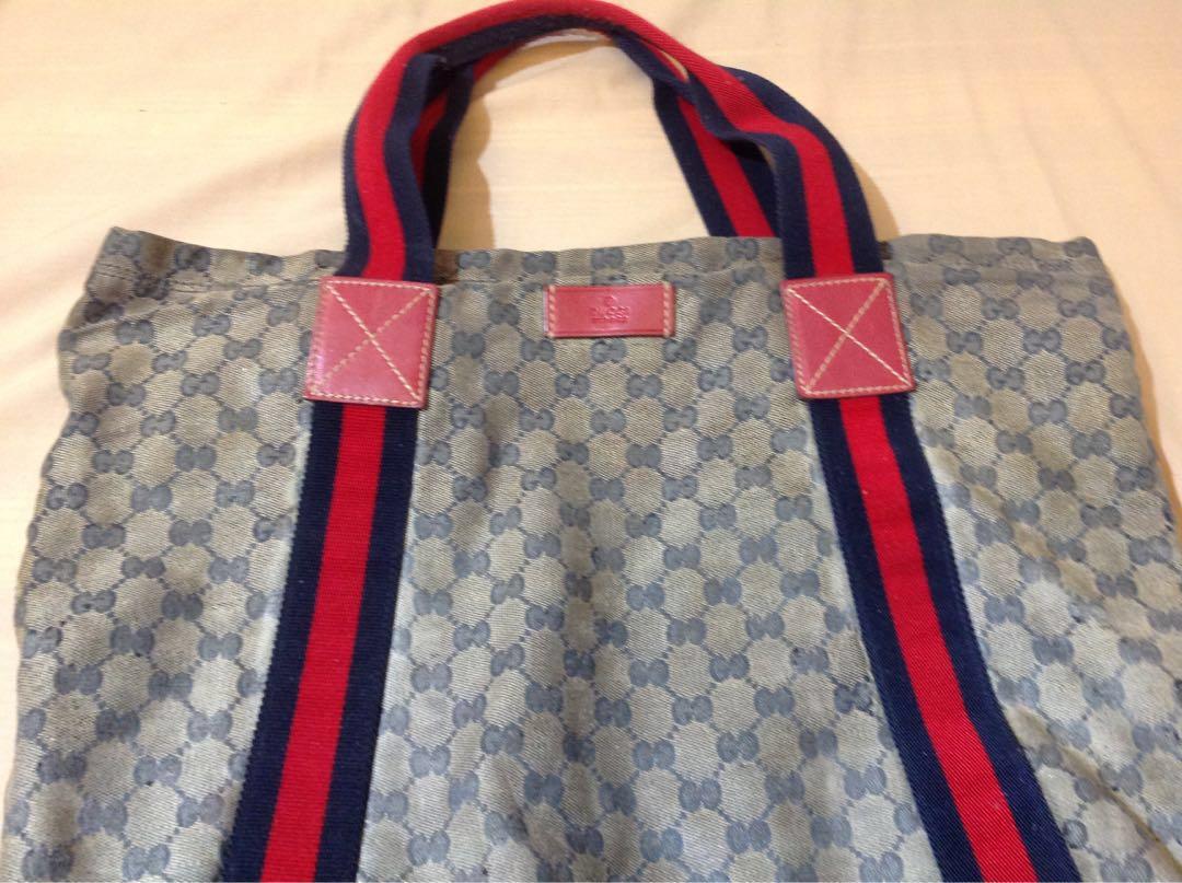 Authentic Gucci (Category: Luxury Bags & Wallets) located in Paranaque City. Submitted by french21closet (Listing ID 225128212, Image 3). Description: 100% wAuthentic Gucci Open Tote bag Needs for restoration as the crystalized color style is not visible anymore, that’s the major flaws but inside interior still good for serious buyers only PM me if interested/SMS 09174506853.