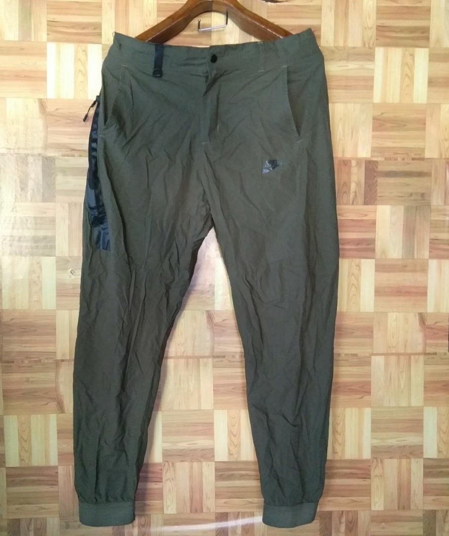 olive green nike tech pants