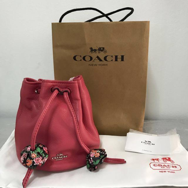 coach petal drawstring wristlet