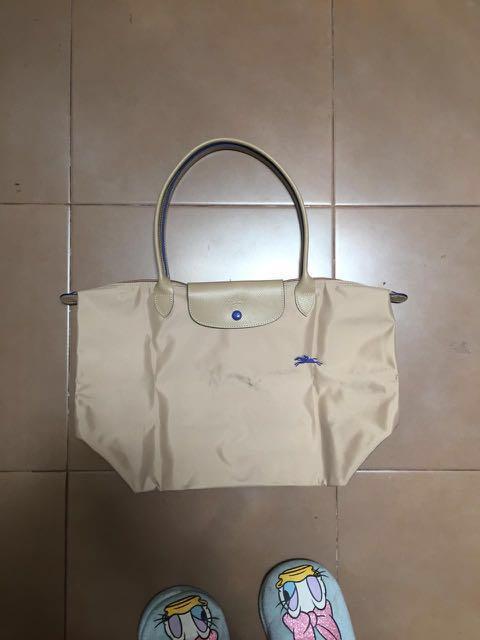 Le pliage acquistati club beige
