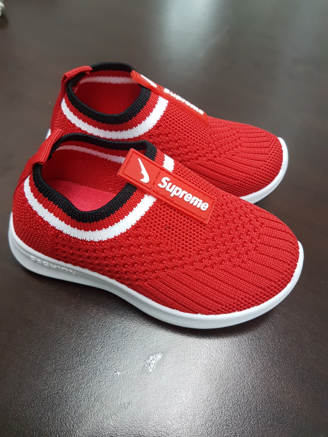 Baby supreme shoes best sale