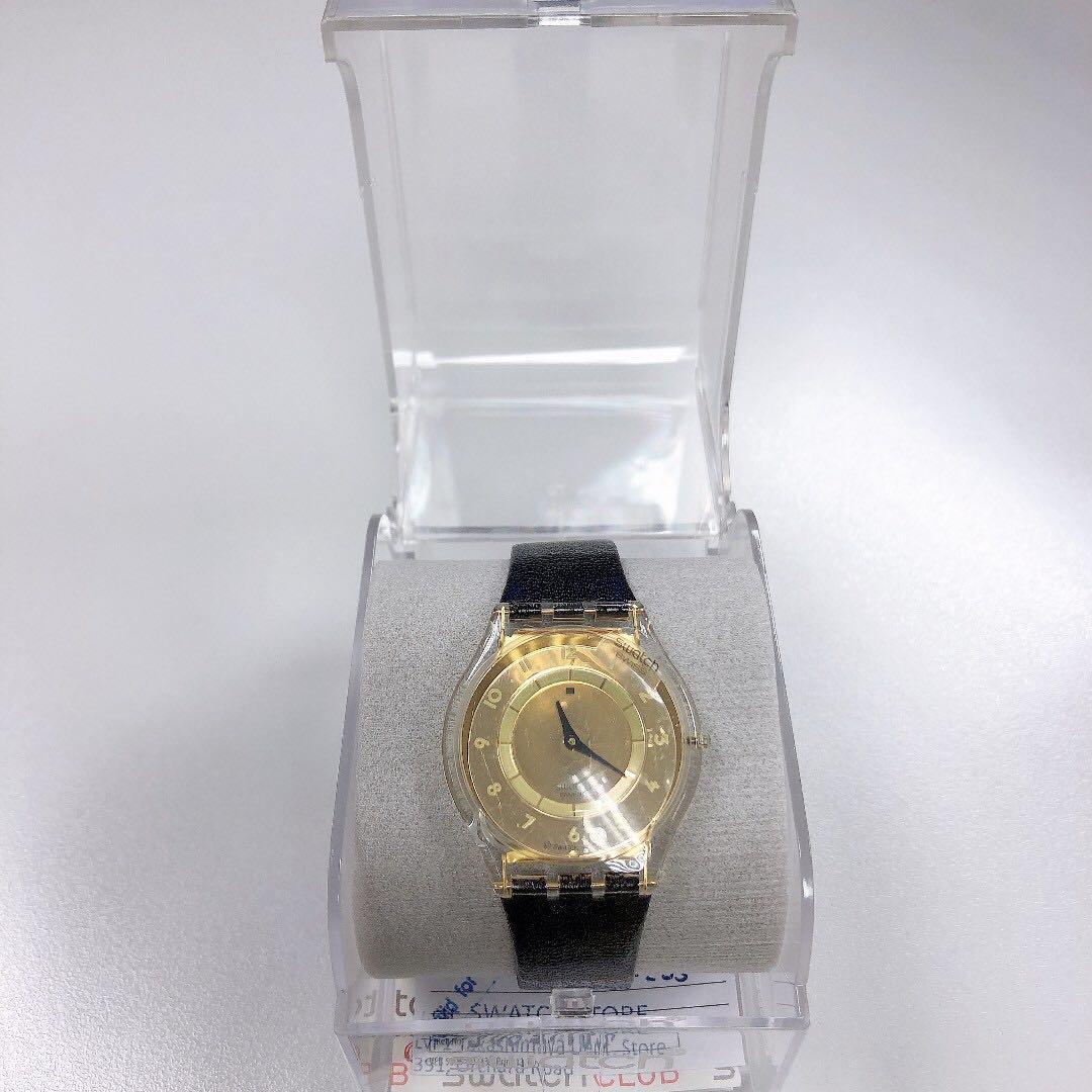 Gold face shop black strap watch