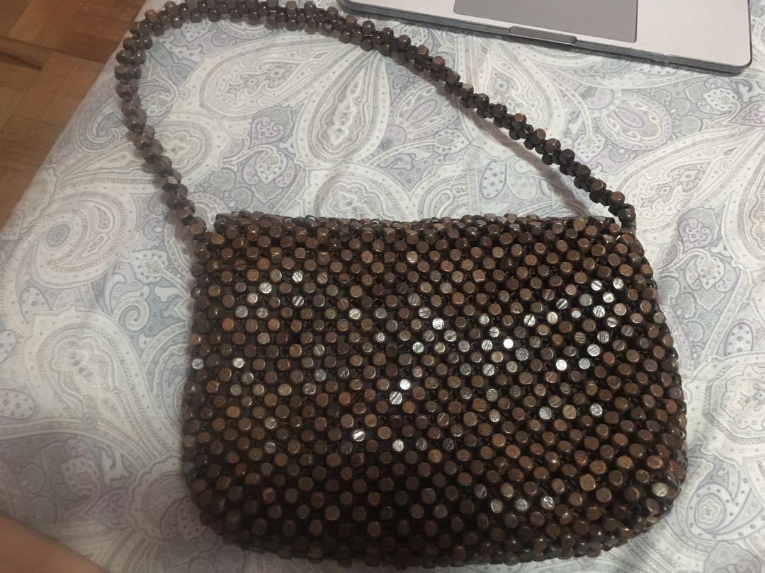The sak top wood bead purse