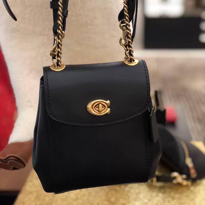 Coach parker 16 backpack black discount