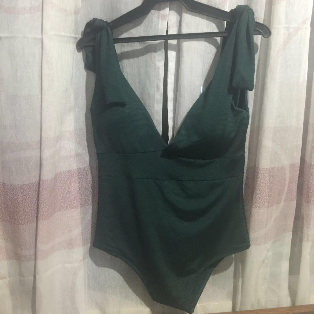 onepiece monokini + free bikini top (Category: Bikinis & Swimsuits) located in Manila. Submitted by asel000 (Listing ID 223477471, Image 2). Description: one piece monokini swimwear material: spandex (stretch) fits small to large available color: olive green .