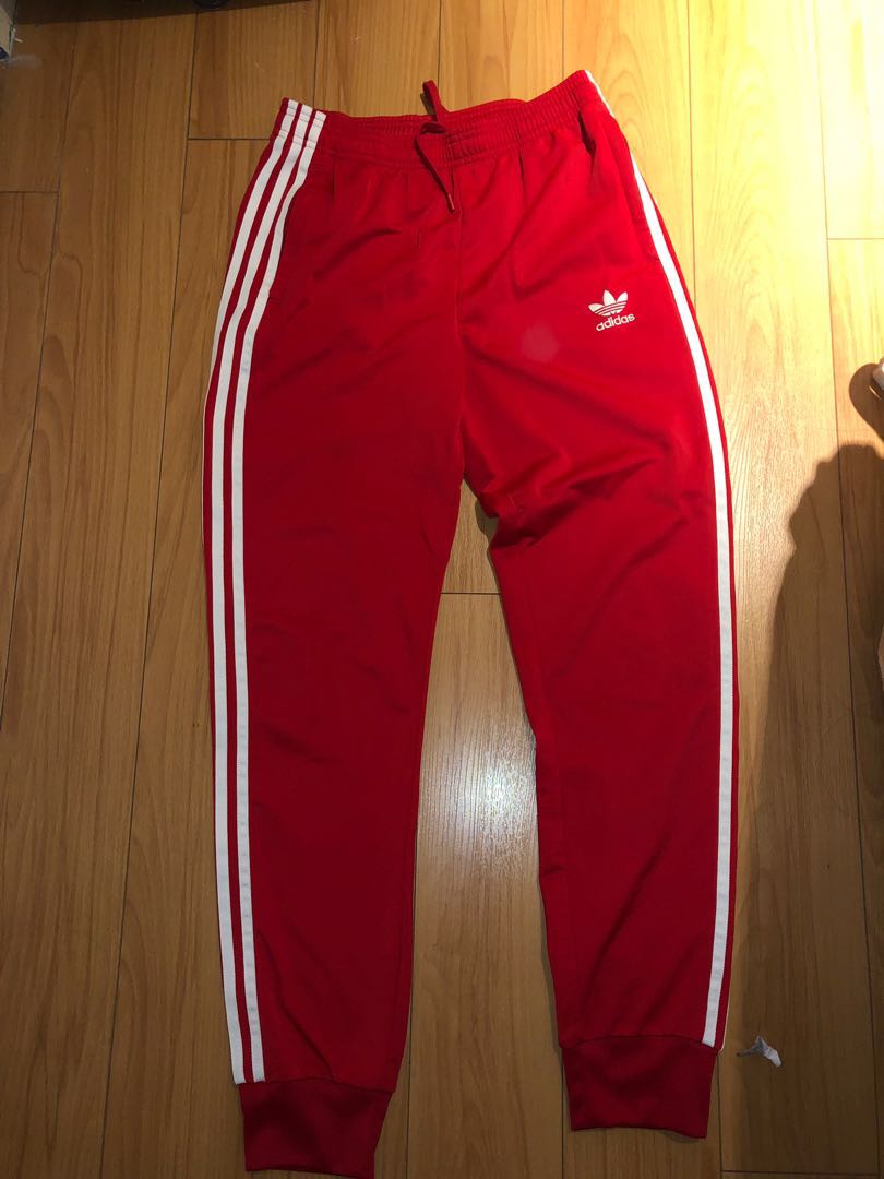 red adidas track pants