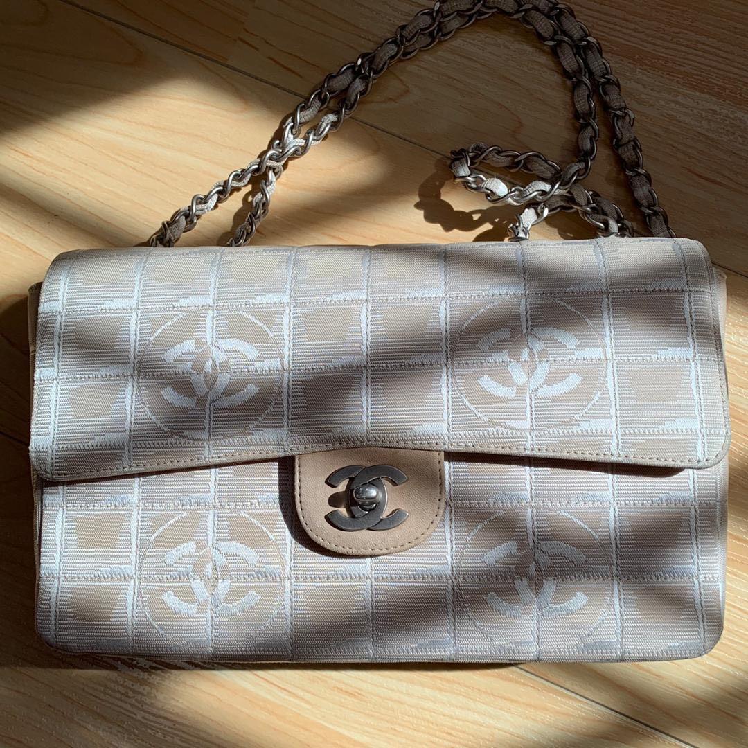 Vintage Chanel Beige Canvas CC Logos Travel Line Flap Two Way Shoulder Or  Sling Bag, Luxury, Bags & Wallets on Carousell