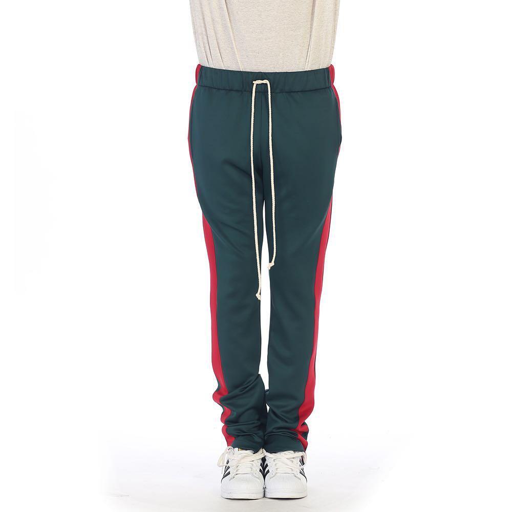 red and green track pants