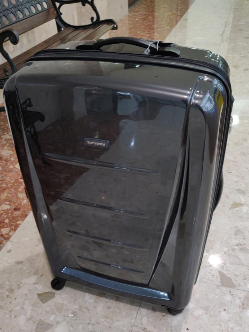 samsonite sigma 76cm expandable spinner weight