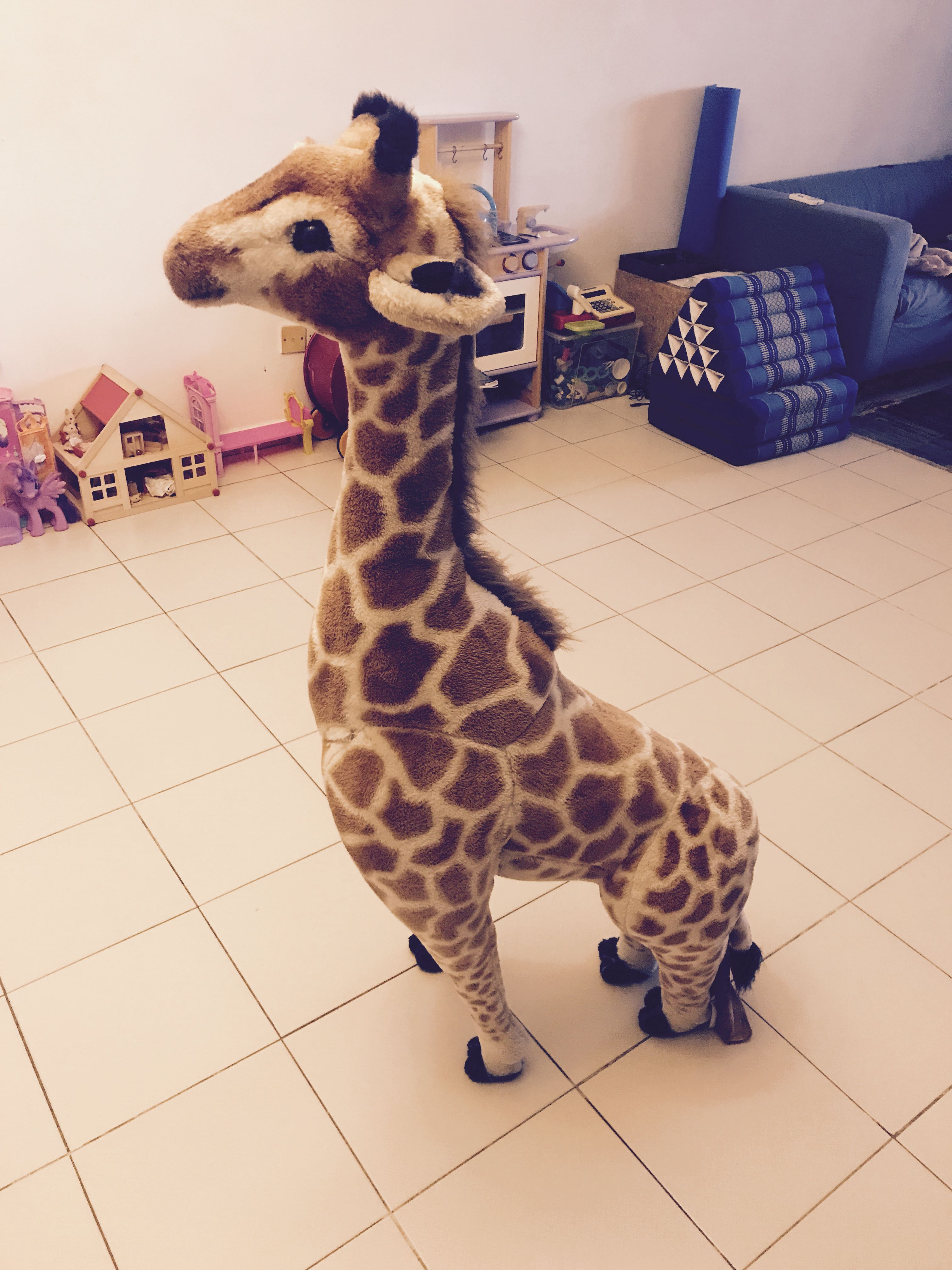 life size giraffe toy