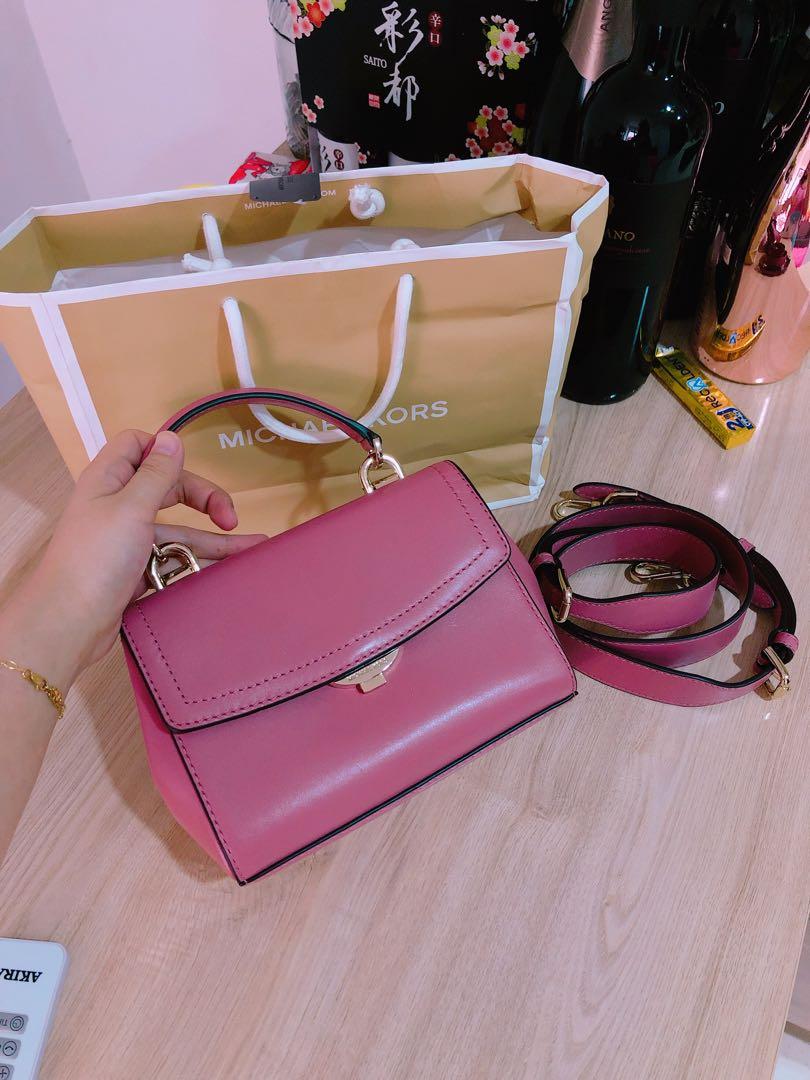 pink michael kors purse and wallet