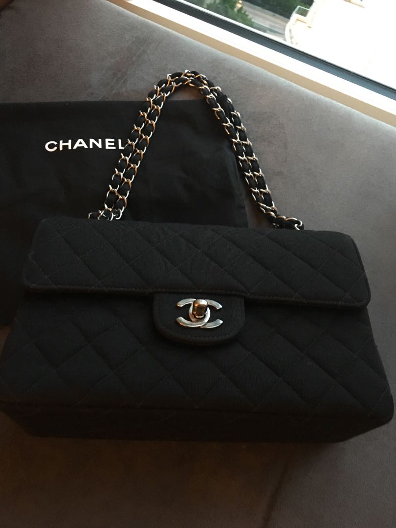 Chanel black jersey flap vintage, Luxury, Bags & Wallets on Carousell