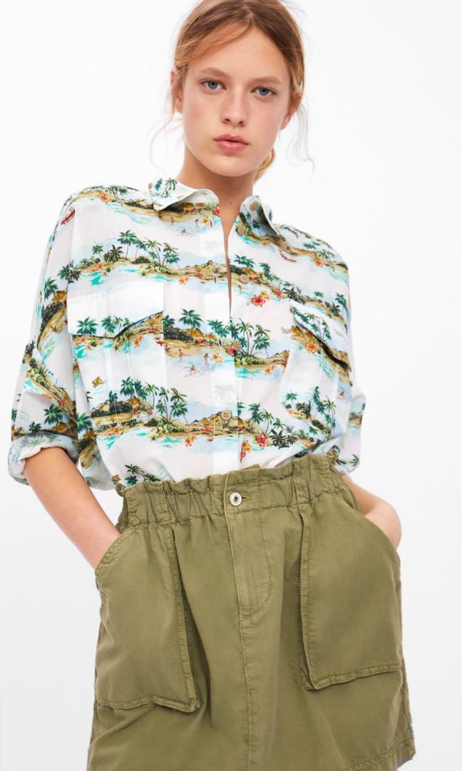 green mini skirt zara