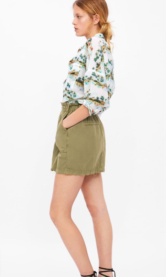 green mini skirt zara