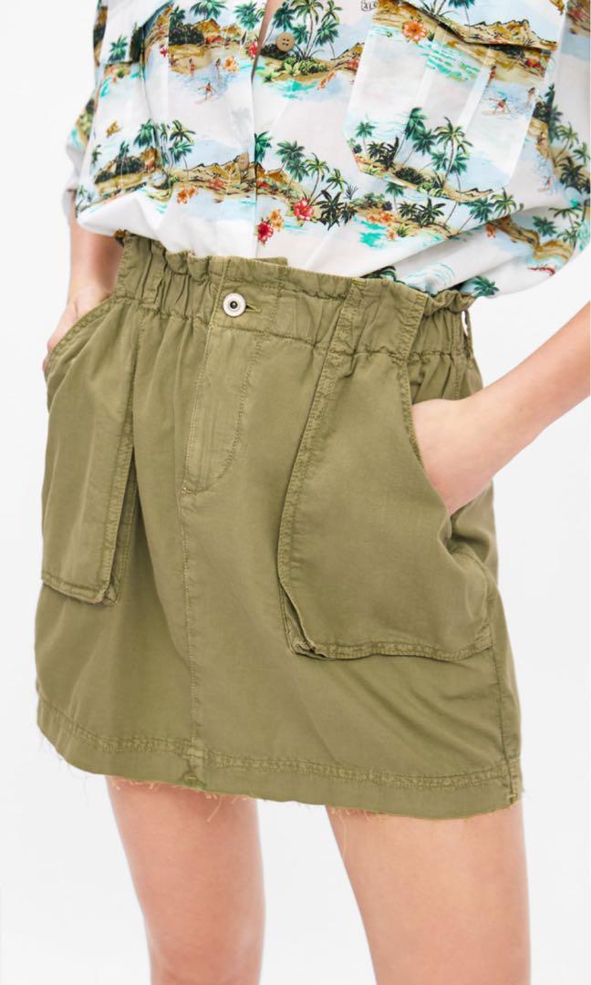 green mini skirt zara