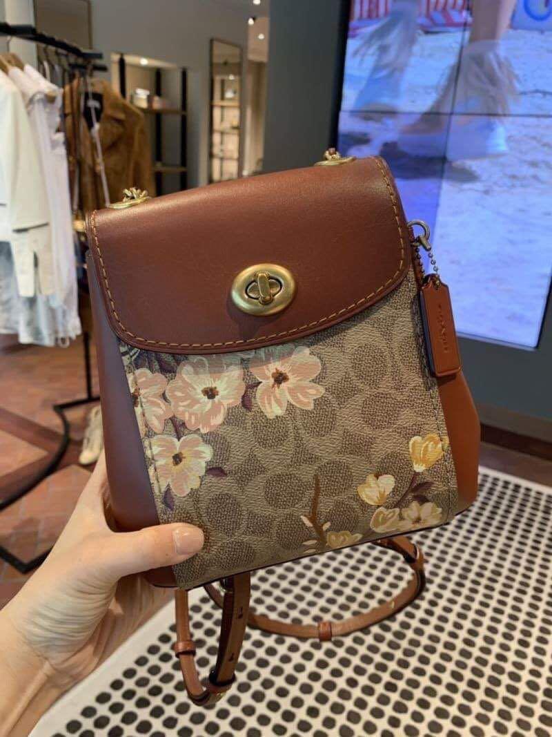 Coach floral mini backpack sales