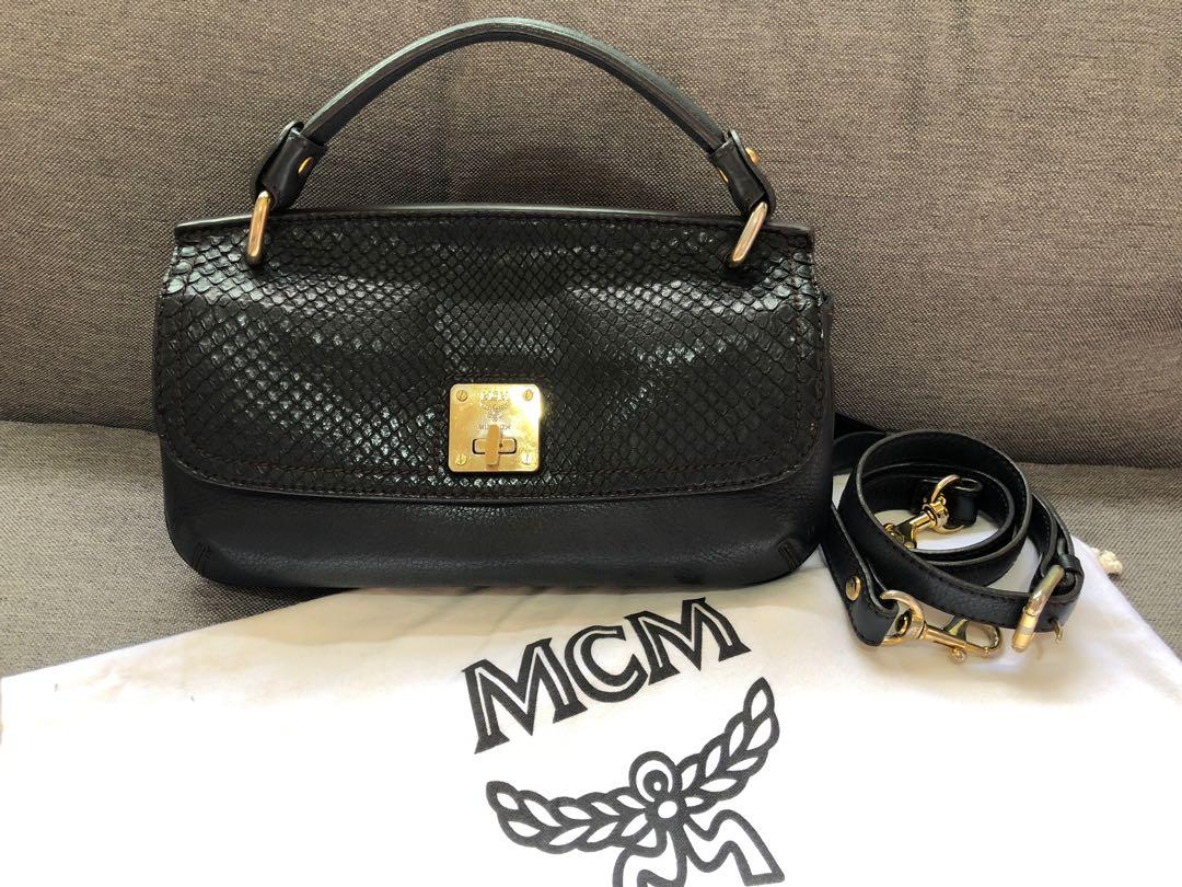 Authentic MCM python skin handbag (Category: Bags & Wallets) located in Singapore. Submitted by paperbunnylover (Listing ID 226396643, Image 1). Description: Authentic and original, comes with dust bag; really great versatile bag that’s easy to match with your outfits and fits a lot for the size; slight signs of wear on the hardware but otherwise in great condition .