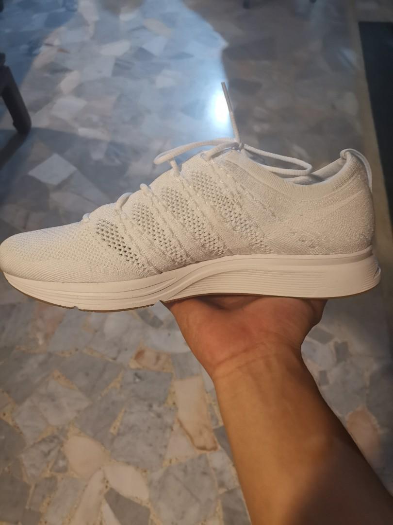 flyknit trainer triple white