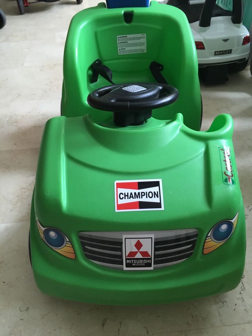 Toy car with pusher, Babies & Kids, Infant Playtime on Carousell