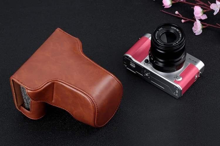 Camera leather case (Category: Camera Bags & Carriers) located in Mandaluyong City. Submitted by atchcatchph (Listing ID 219533393, Image 1). Description: ✔For Fujifilm xA2/xA3/xa5/xA10/xA20/xt10/xt20/xE3 ✔For Sony a5000, a6000, a6500 ✔Colors available: Light brown, dark brown, black, light pink & dark pink.