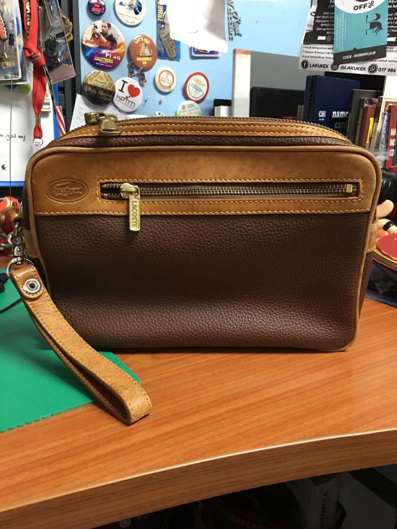 Lacoste clutch bag sales