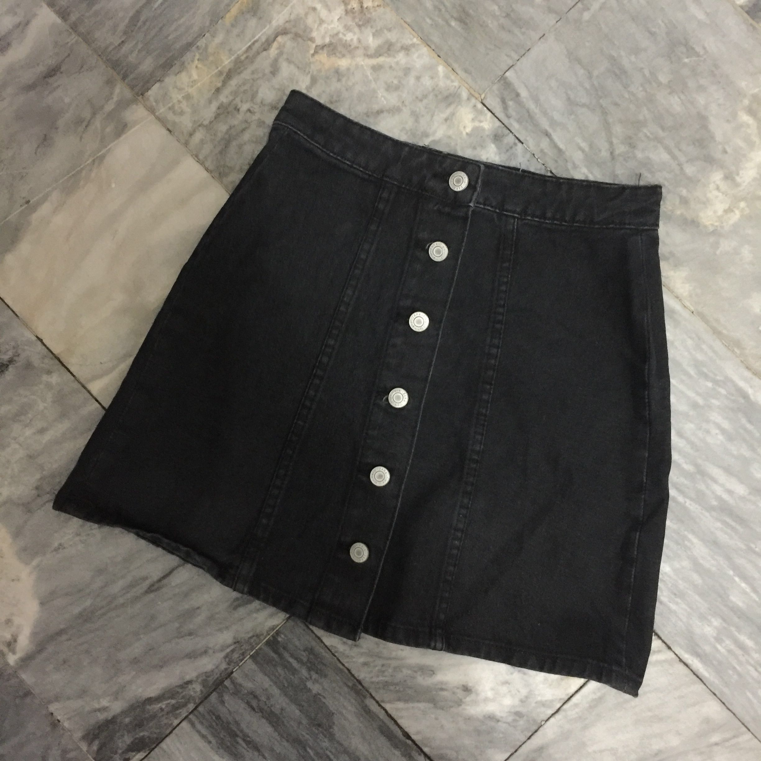 black denim skirt with buttons down the front