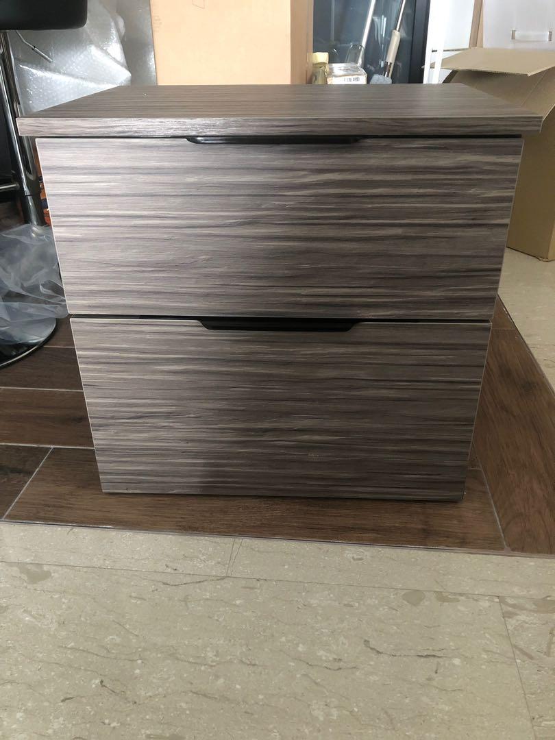 Bedside table (Category: Tables & Sets) located in Singapore. Submitted by goh.keane (Listing ID 226876756, Image 1). Description: Brand new beside drawer. Bought 1 extra. Self pick at Bukit Panjang. Negotiable if fast deal Dimensions: (L) 47cm (H) 44.5cm (W) 34.8cm.