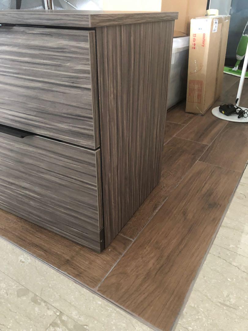 Bedside table (Category: Tables & Sets) located in Singapore. Submitted by goh.keane (Listing ID 226876756, Image 2). Description: Brand new beside drawer. Bought 1 extra. Self pick at Bukit Panjang. Negotiable if fast deal Dimensions: (L) 47cm (H) 44.5cm (W) 34.8cm.