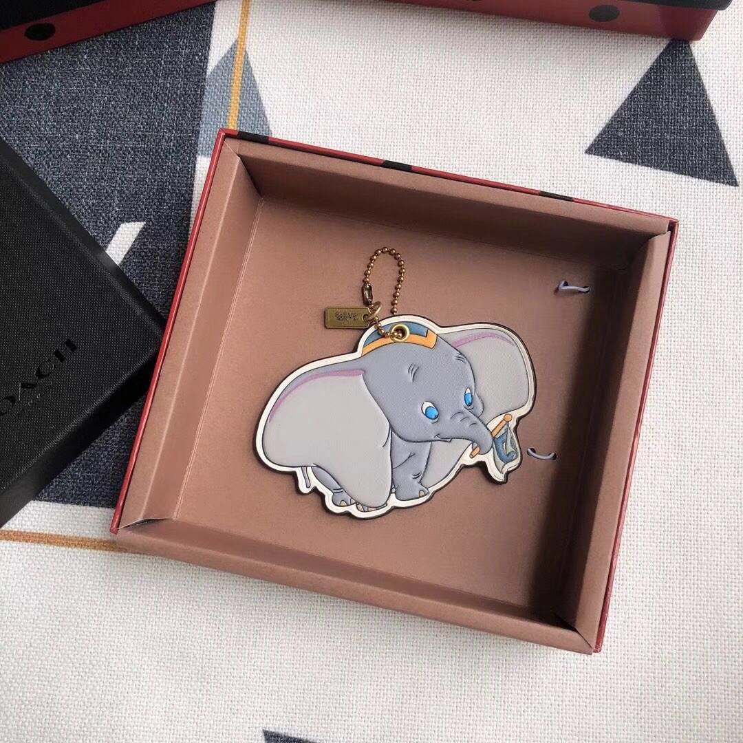 coach dumbo charm