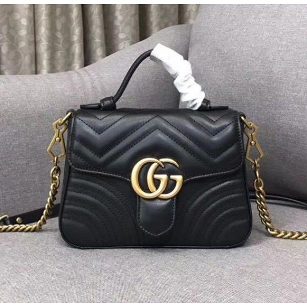Gg marmont mini best sale top handle bag price