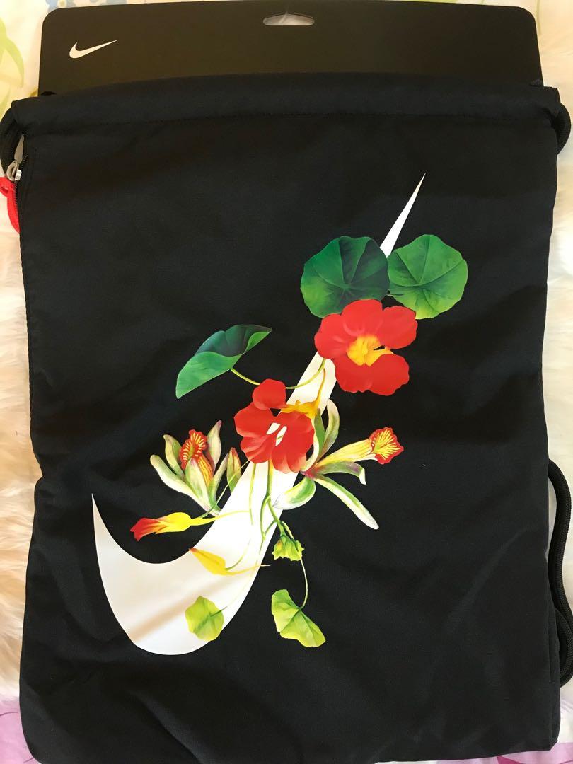 Nike floral drawstring bag shop