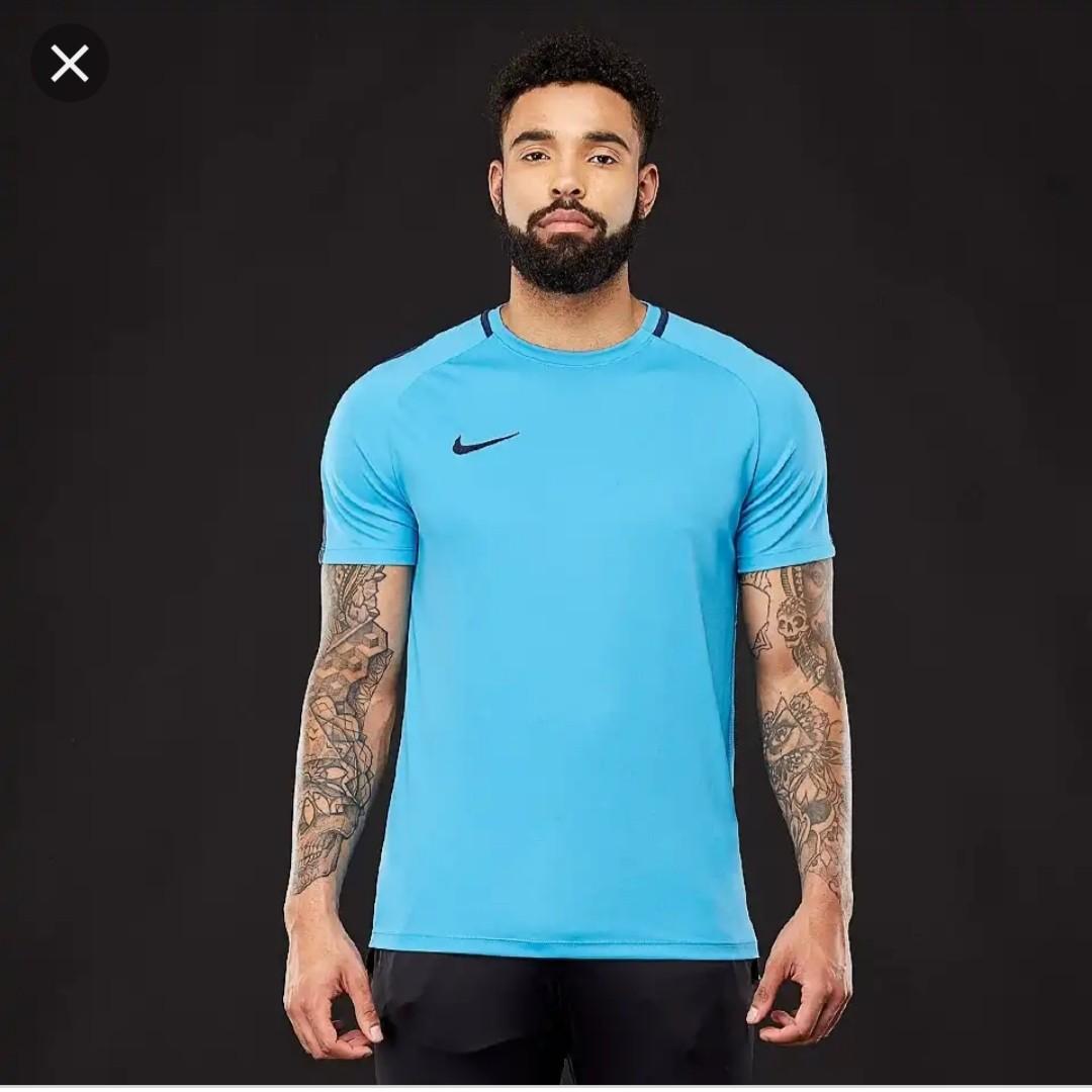 light blue dri fit shirt