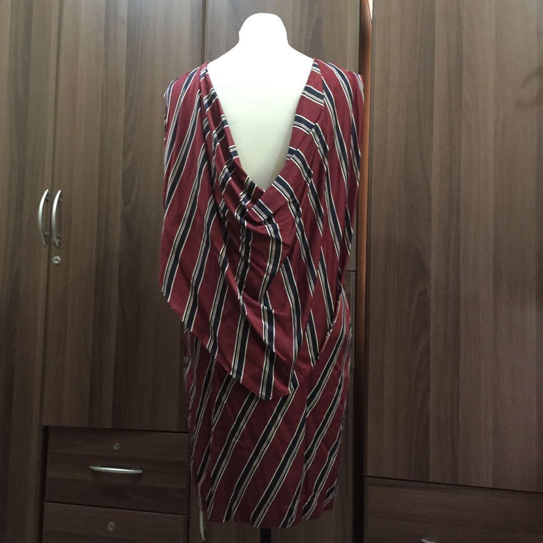 [PRELOVED] Maroon Striped Classy Dress w/ Stylish Back (Category: Dresses) located in Pasay City. Submitted by ambetscloset (Listing ID 226862701, Image 2). Description: 💋 NO FLAWS 💋 Fits M-L 💋 Silky material 💋 W/ inner layer 💋 W/ pockets .